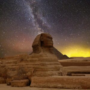 Stunning capture of the Great Sphinx of Giza beneath a star-lit sky with the Milky Way.